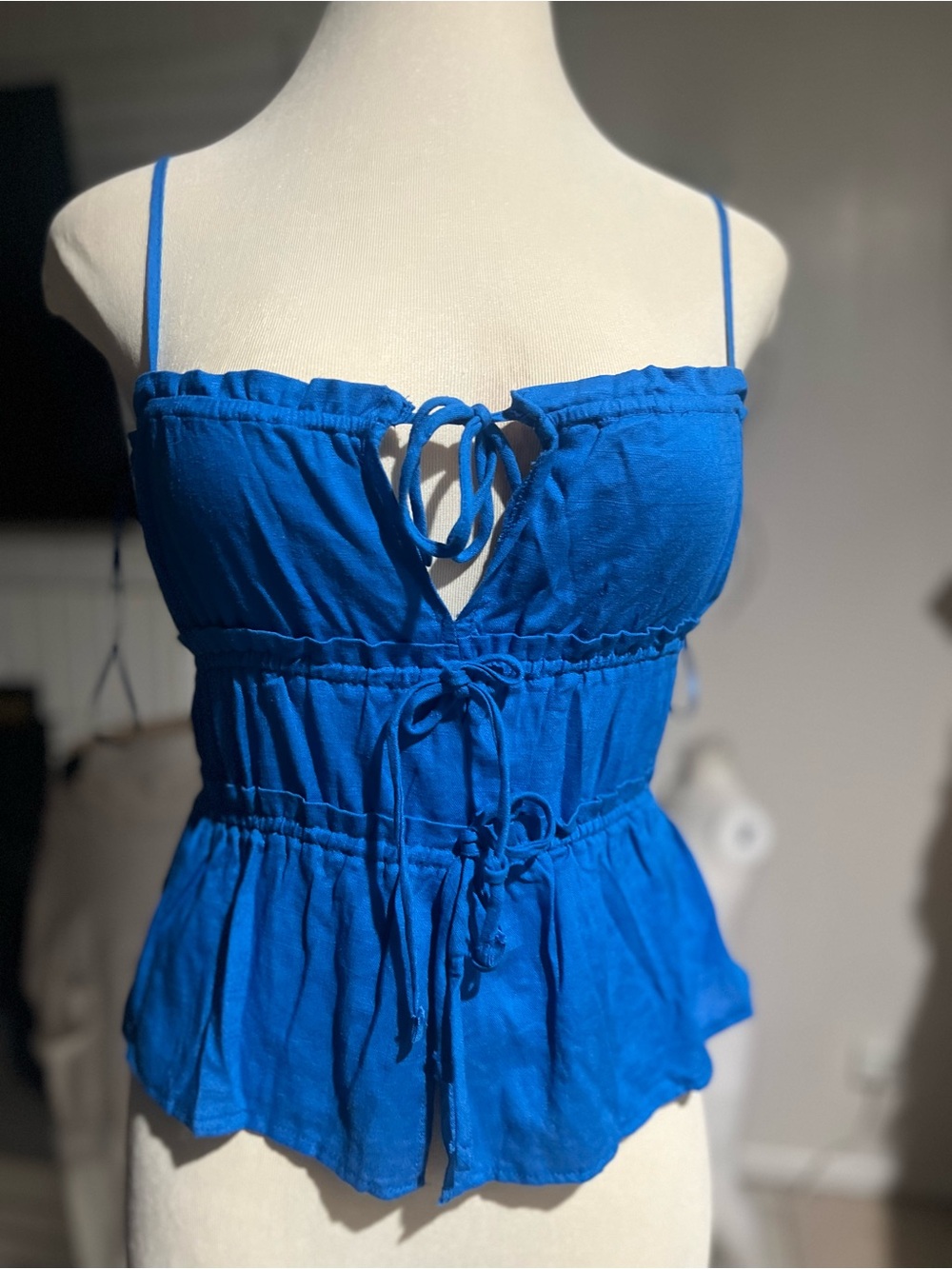 Blue Spaghetti Strap Tie-Front Peplum Top